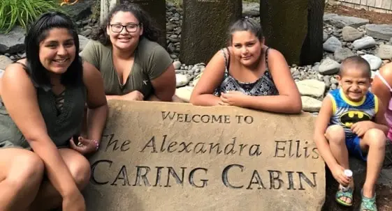 Group shot at the Alexandra Ellis Caring Cabin