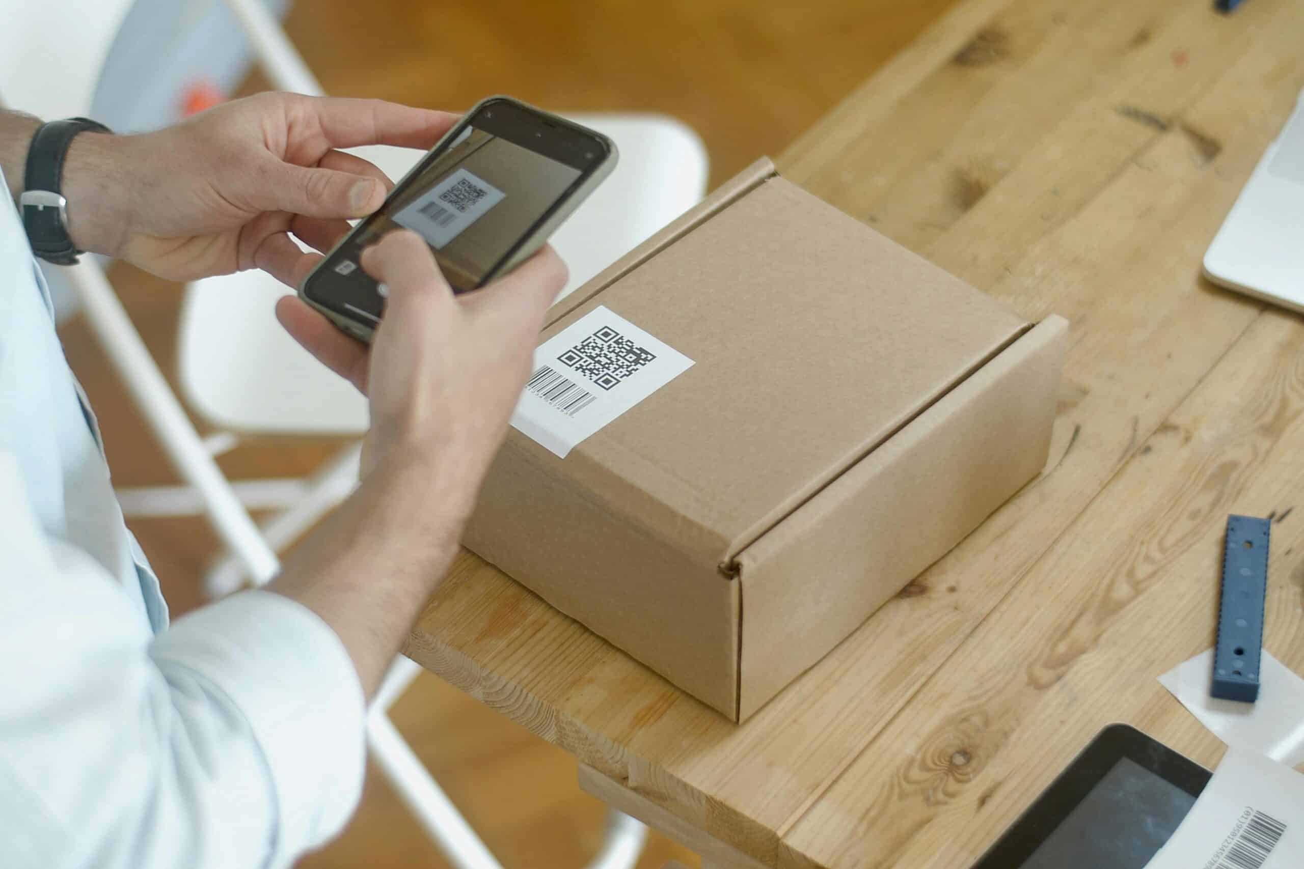 Man scanning QR code on phone