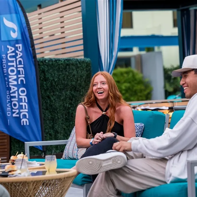 two people with drinks